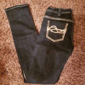 Skinny jeans- Cowgirl Tuff 27 x 35